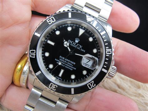 1999 rolex submariner cost|Rolex 16610 bezel.